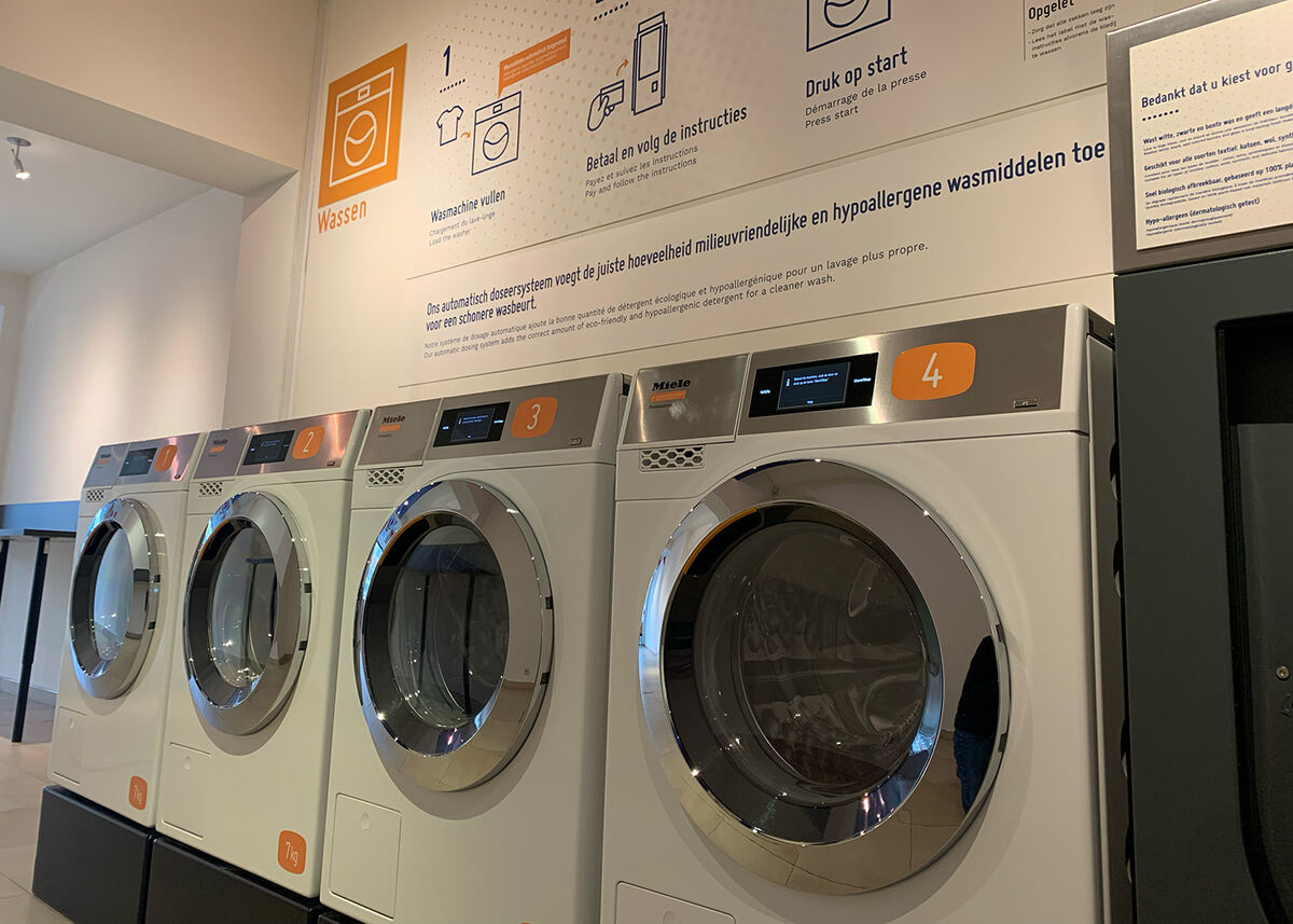 Bubbleworks-wassalon met genummerde Miele-wasautomaten